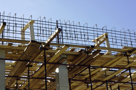 Wooden construction stage against the sky. Sunny day
