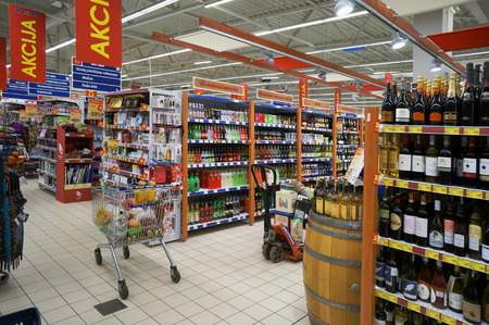 VILNIUS, LITHUANIA - DECEMBER 13, 2014: Christmas sales and discounts in Maxima shop. Maxima has more than 500 shops in  Baltic States. The brand has  more than one million buyers a day.のeditorial素材