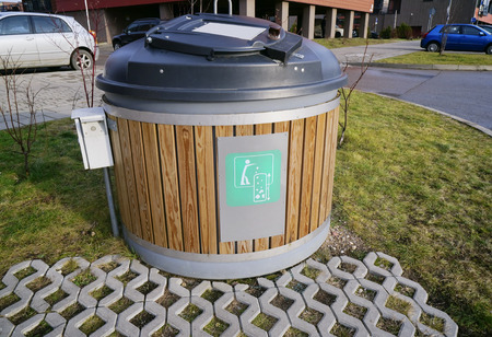 Modern locked green ecological trash bin in the new residential city areaのeditorial素材