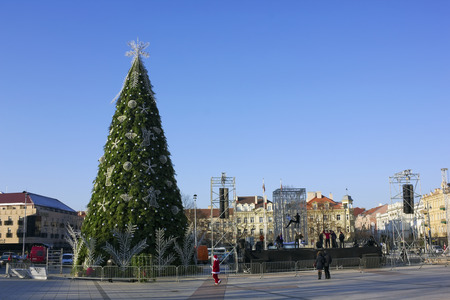 VILNIUS, LITHUANIA - NOVEMBER 29, 2014: Preparation of the Christmas fir-tree on a main square of the city for a ceremonial opening of New Year's actions. Frosty sunny dayのeditorial素材