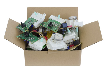 Mechanical  electronic devices of timers for microwave ovens  in box are prepared  for sending to...