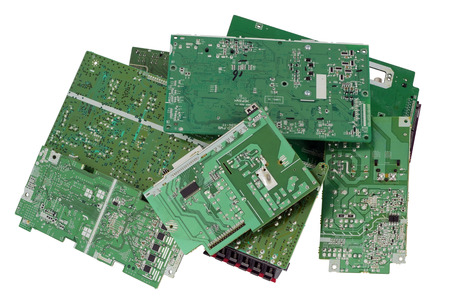 Old electronic mass production  printed-circuit boards are prepared for utilization.  Only position...
