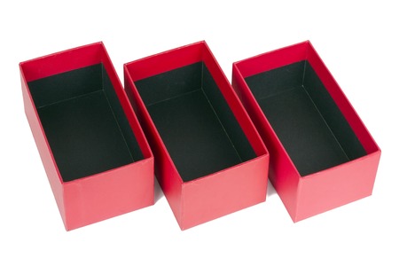 Small empty cardboard red boxes for electronic gadgets. Isolated