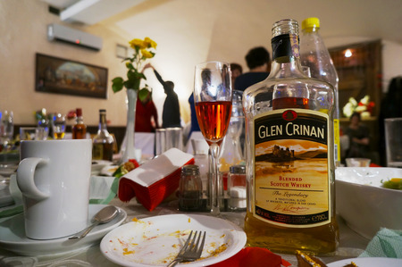 VILNIUS, LITHUANIA - APRIL 24, 2015: Very drunk party in the center of Europe with whisky of the Glen Crinan brand. The trademark was registered in 1932 in Glasgowのeditorial素材