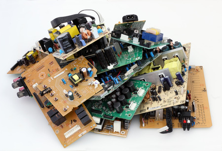 VILNIUS, LITHUANIA - DECEMBER 30, 2015: The heap of electronic printed circuit boards from audio...