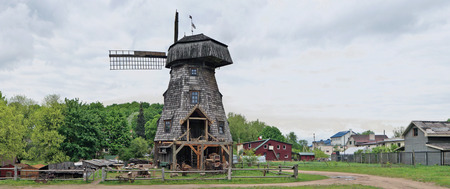VILNIUS, LITHUANIA - MAY 15, 2016: New museum of a retro agricultural equipment , tools and buildings in the territory of an old windmill. It is Pilaitie area- the most forest and rural district of the Vilnius.のeditorial素材