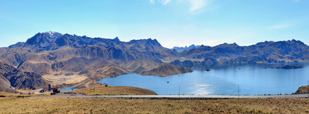 PUNO, PERU - JUNE 08, 2016: The tourist route and road passes on the left edge of the mountain Titicaca Lake . Cold sources and winds over the lake give it an average surface temperature of 10 to 14 ?Cのeditorial素材