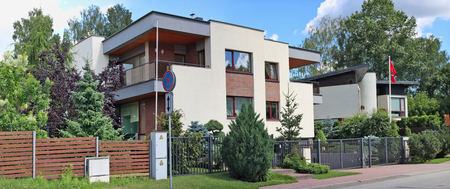 VILNIUS, LITHUANIA - JULY  06, 2017:  Fragment of the street, fence  and modern elite  apartment buildings in the historic elite central area of the Lithuanian capital - Zverinas (Zoo park)のeditorial素材