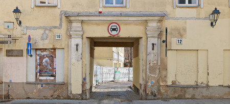 VILNIUS,  LITHUANIA- MARCH 31, 2018: Passage to the courtyard of the old house, in which lived the...