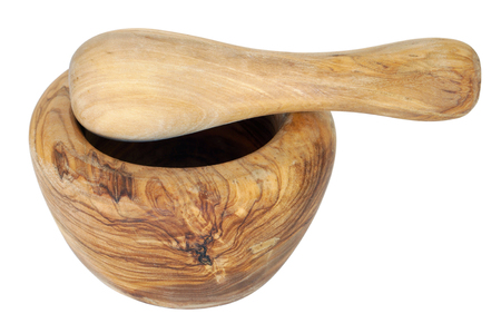 Kitchen mortar and pestle are made from solid walnut wood. Isolated on white with patchの写真素材