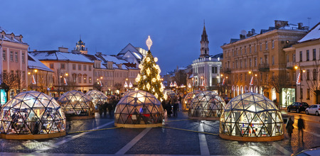 VILNIUS, LITHUANIA - DECEMBER 26, 2018: Christmas European  city square and decorated illuminate fir...