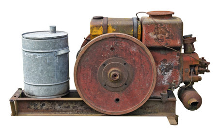Retro  small  tractors  diesel engine  whith  wheel. The metal equipment is made more than hundred...