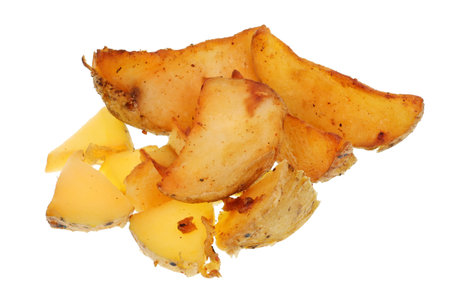 Food of the future concept - small slices of fried potatoes. Isolated on white studio macroの写真素材