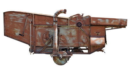 Old rusty rustic machinery isolated on white