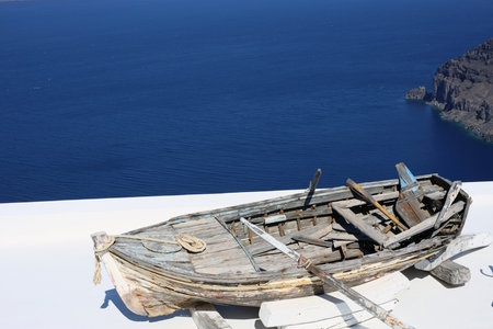 Old wooden fishing boat on the background of the Mediterranean  seaの写真素材