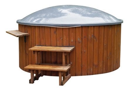 Bath in Japanese style - wooden barrel with hot water. Isolated on whiteの写真素材