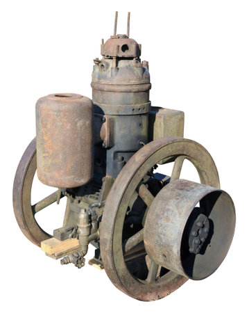 Retro  small    diesel water pomp for mill. Isolated on whiteの写真素材
