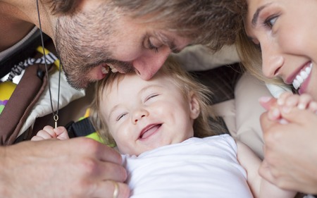 Happy family baby parents