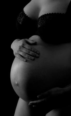 B W pregnant female torso abdomenの写真素材