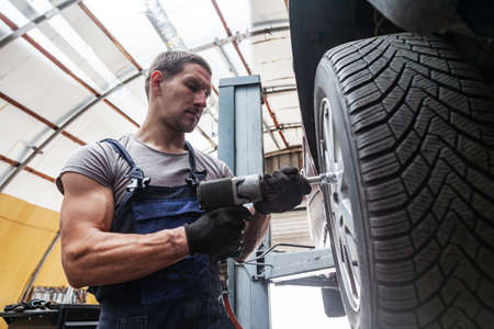 Wheel Technician Repair Auto Service Mechanic Vehicleの写真素材