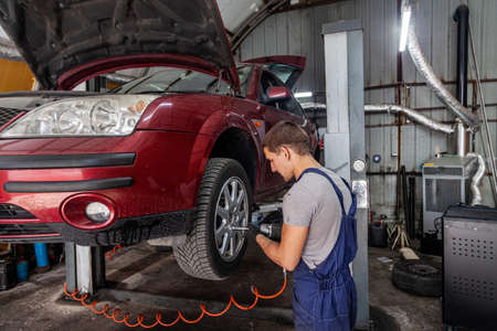 Wheel Technician Repair Auto Service Mechanic Vehicleの写真素材