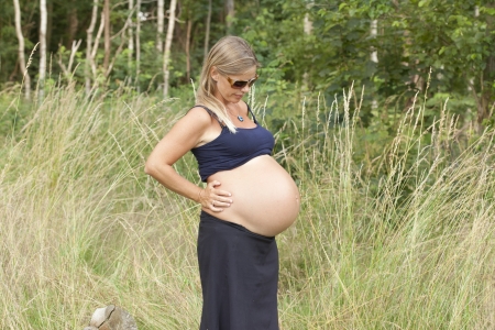 Pregnant woman in the natureの写真素材