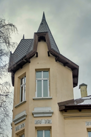 Fragment of the old renovated building with windowsの写真素材