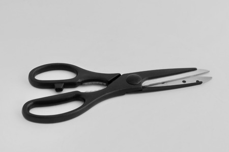 Closeup image of big black handle scissors