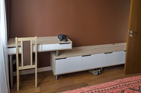 Work nook by bedroom in renovated apartment in Sofia, Bulgariaの写真素材
