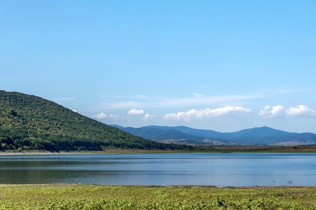 Beauty look toward picturesque Rabisha  lake and mountain over Magura cave, Belogradchik, Bulgariaの写真素材