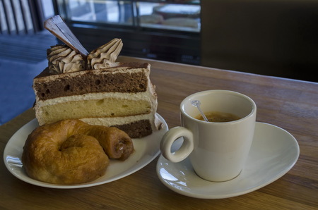 Treat for friend of cake, baklava and coffee, Sofia, Bulgariaの写真素材