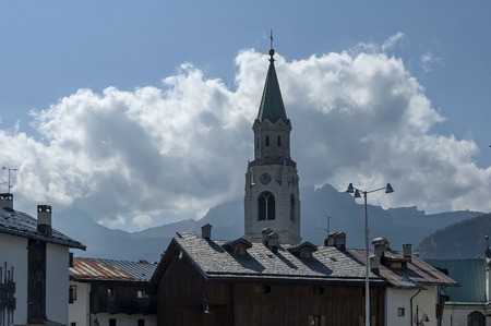 Autumnal corso Italia, the Church or Synagogue in the town centre of Cortina d'Ampezzo, Dolomites, Alps, Veneto, Italy,   Europeの写真素材