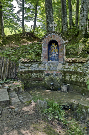 Monument of burned six monks in invasion and in the place springs healing water, Klisura Monastery St. Cyril and St. Methodius, founded in the 12th century, Balkan mountain, by the river Vrerestitsa, under Todorini dolkie peak, Varshets, Bulgaria, Europeの写真素材
