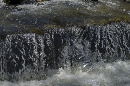 View closeup of waterfall part at cascade of river Bistritsa between village  Bistritsa and village Pancharevo, place for tourism and travel in Vitosha mountain,  Bulgariaの写真素材