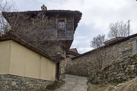 Town unique with its cobblestone streets, painted in bright colors houses with verandahs and picturesque eaves, Koprivshtitsa, Bulgaria, Europeの写真素材