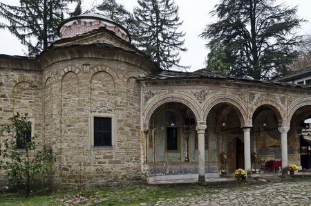 Beautiful Church of the Assumption of the Virgin in the churchyard, a holy place in the Troyan...
