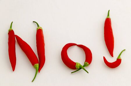 Sign or symbol No, made from the fruit of fresh chilli red pepper with a green stalk, Sofia, Bulgariaの写真素材