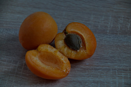 Group of  fresh ripe apricot fruit whole and slice, can be used as background, Sofia, Bulgaria