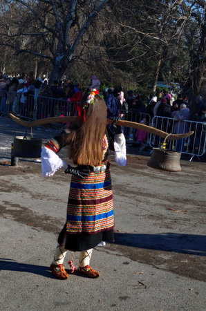 Volunteer mummers, pantomime artists of nature games, roam the town in a traditional custom, Sofia, Bulgariaの写真素材