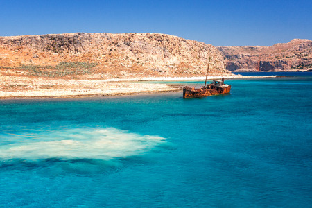 rusting shipwreck at the seaside