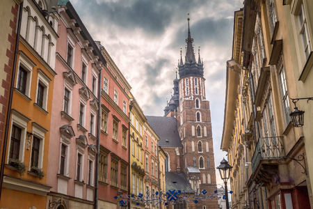 Krakow, street in the historic Polish city with Saint Mary's Basilica.の写真素材