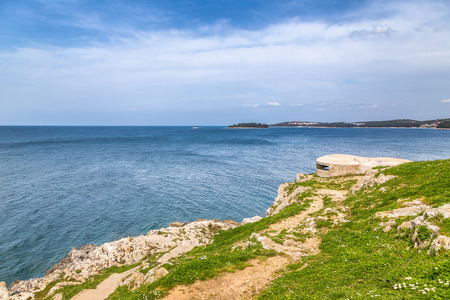 Rocky coast with shelter in Rovinj at the Adriatic Sea, Croatia, Europe.の写真素材