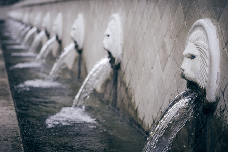 Venetian Lion Head Fountain in Spili on Crete, Greece, Europe.の写真素材