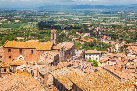 Montepulciano, a medieval and renaissance hill town in  the Italian province of Siena in southern Tuscany, Italy. View from above to the town and its surroundings.の写真素材