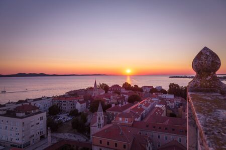 Beautiful sunset on the Adriatic Sea at the Croatian town of Zadar, Europe.の写真素材