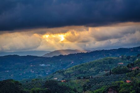 Sunset in landscape above Montecatini Terme town in Tuscany, Italy, Europe.の写真素材