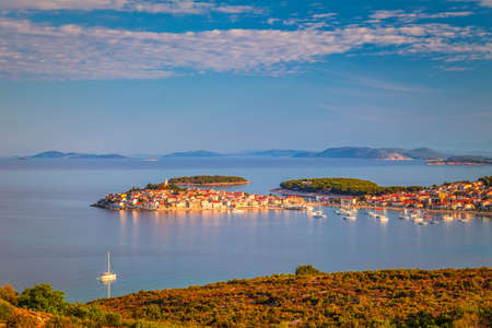 Panoramic view of Adriatic coast with The Primosten town at the colorful dawn of the day, Croatia, Europe.の写真素材
