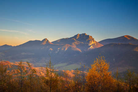 Autumn rural landscape with mountains peaks on background. The Mala Fatra national park, Slovakia,...