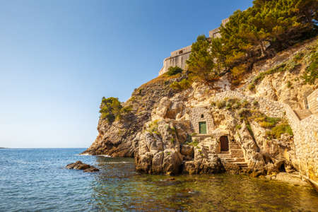 Sea cliff of fort Lovrijenac, fortress outside the western wall of the city of Dubrovnik in Croatia, Europe.の写真素材