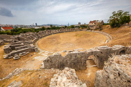 Ruins of the amphitheater of archaeological roman settlement in the Solin, near Split town, Croatia, Europe.の写真素材